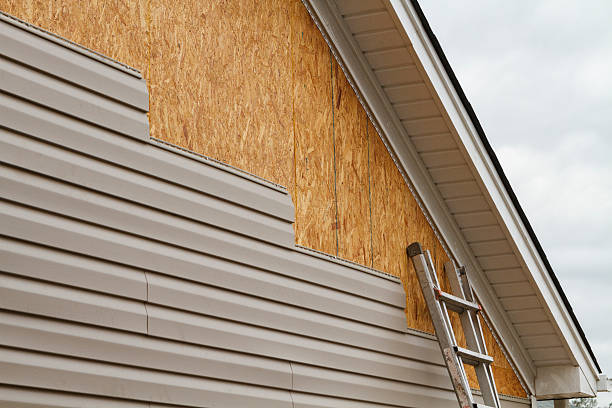 Professional Siding technician working in Morgan, PA